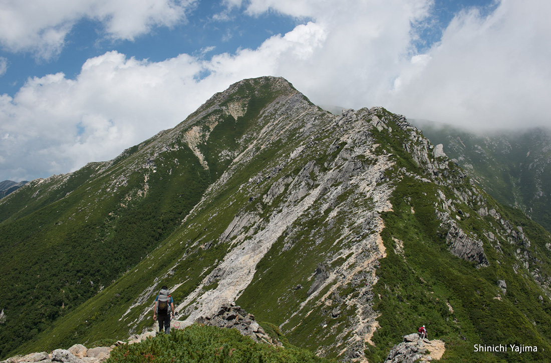 Heading towards the massive Mt. Jonendake that proudly overlooks the Northern Alps.